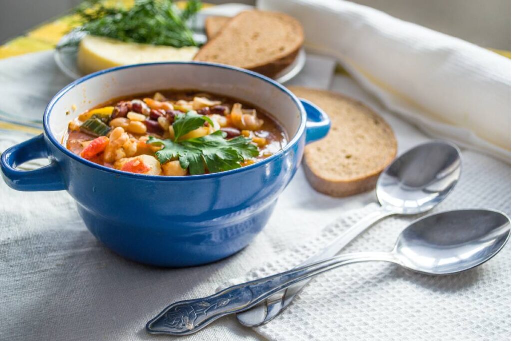 Bowl of soup with beans and vegetables.